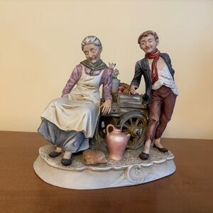 Vintage Capodimonte Figure - Old Woman and a Sharp Man Leaning on Vendor Cart